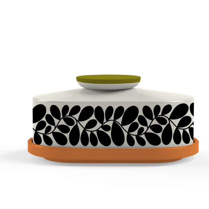 Decorative container with black leaf pattern on a white background