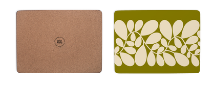 Brown cork mat and green placemat with leaf pattern on a white background