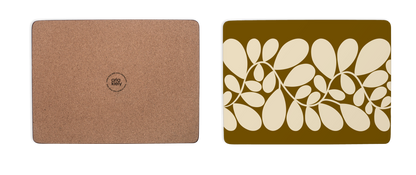 Cork mouse pad on the left and a decorative placemat with leaf pattern on the right.