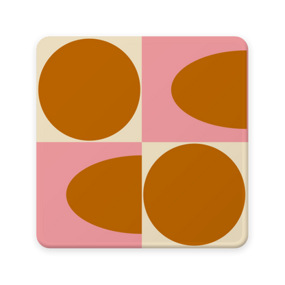 Square coaster with geometric design of brown circles on a pink and beige background