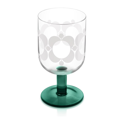 Clear glass with floral design and green base on a white background