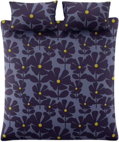 A bedding set featuring a duvet cover and two pillowcases with a retro floral pattern in dark purple and navy blue, accented with small yellow dots.