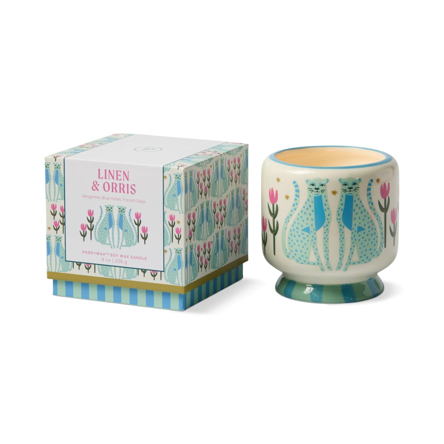 Decorative candle with a matching box featuring cat illustrations on a white background