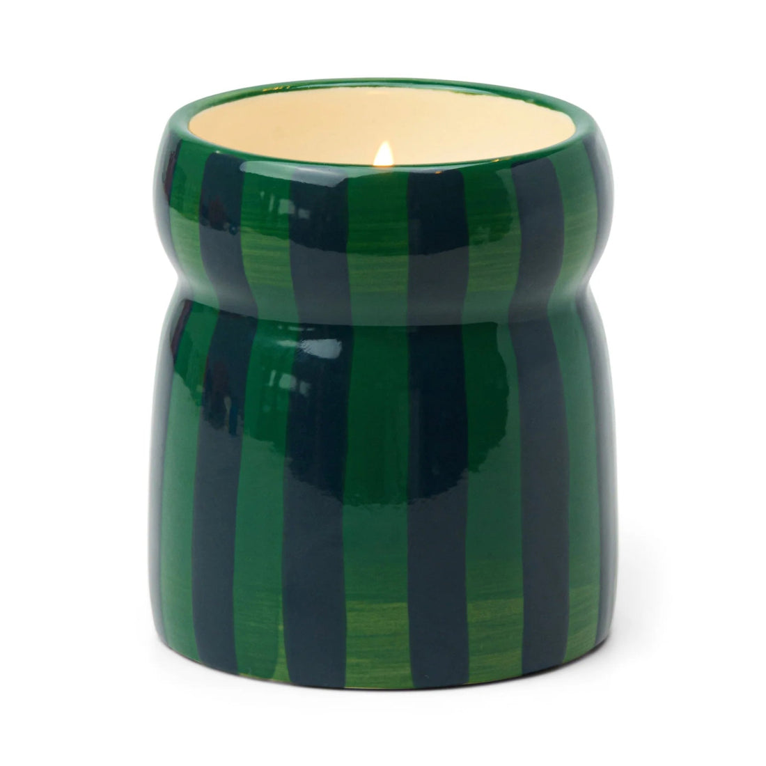 Green striped candle holder with a lit candle on a white background