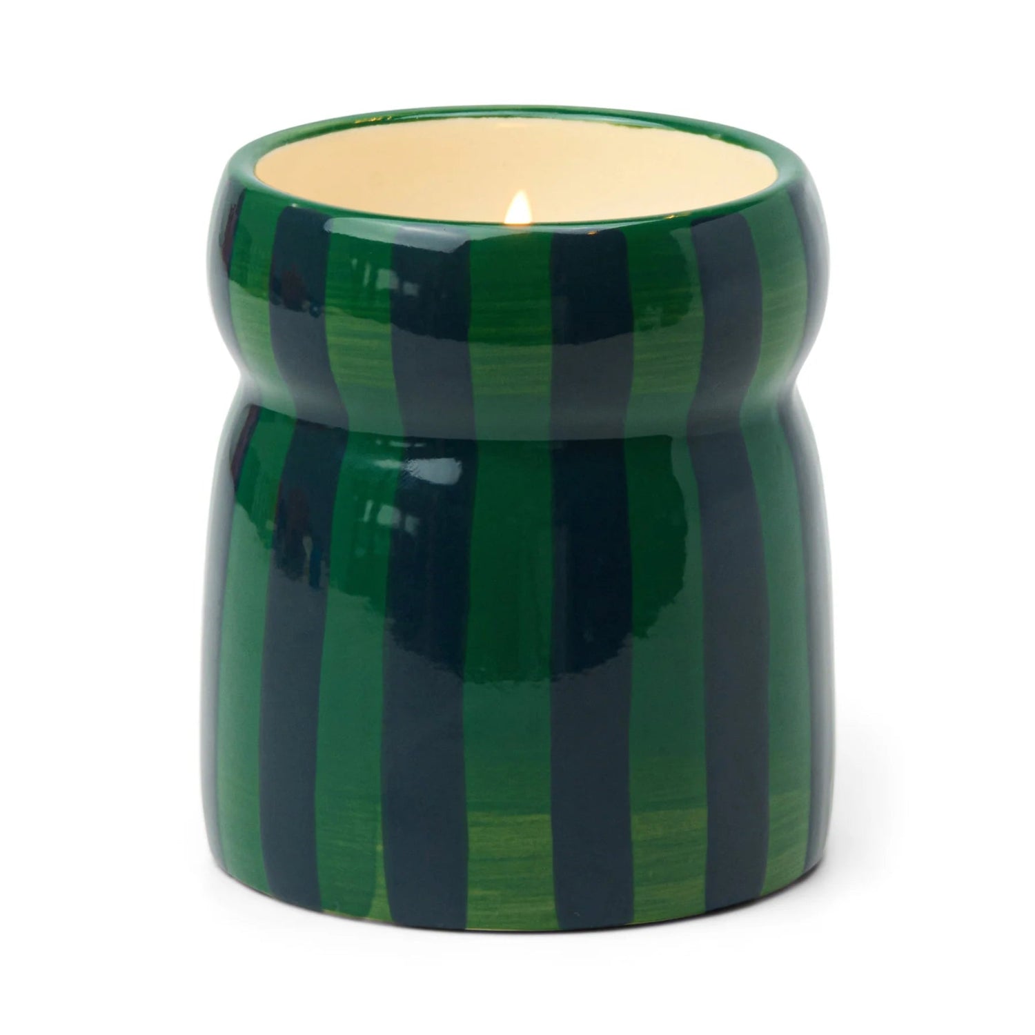 Green striped candle holder with a lit candle on a white background