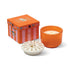 Orange candle with decorative lid and matching box on a white background