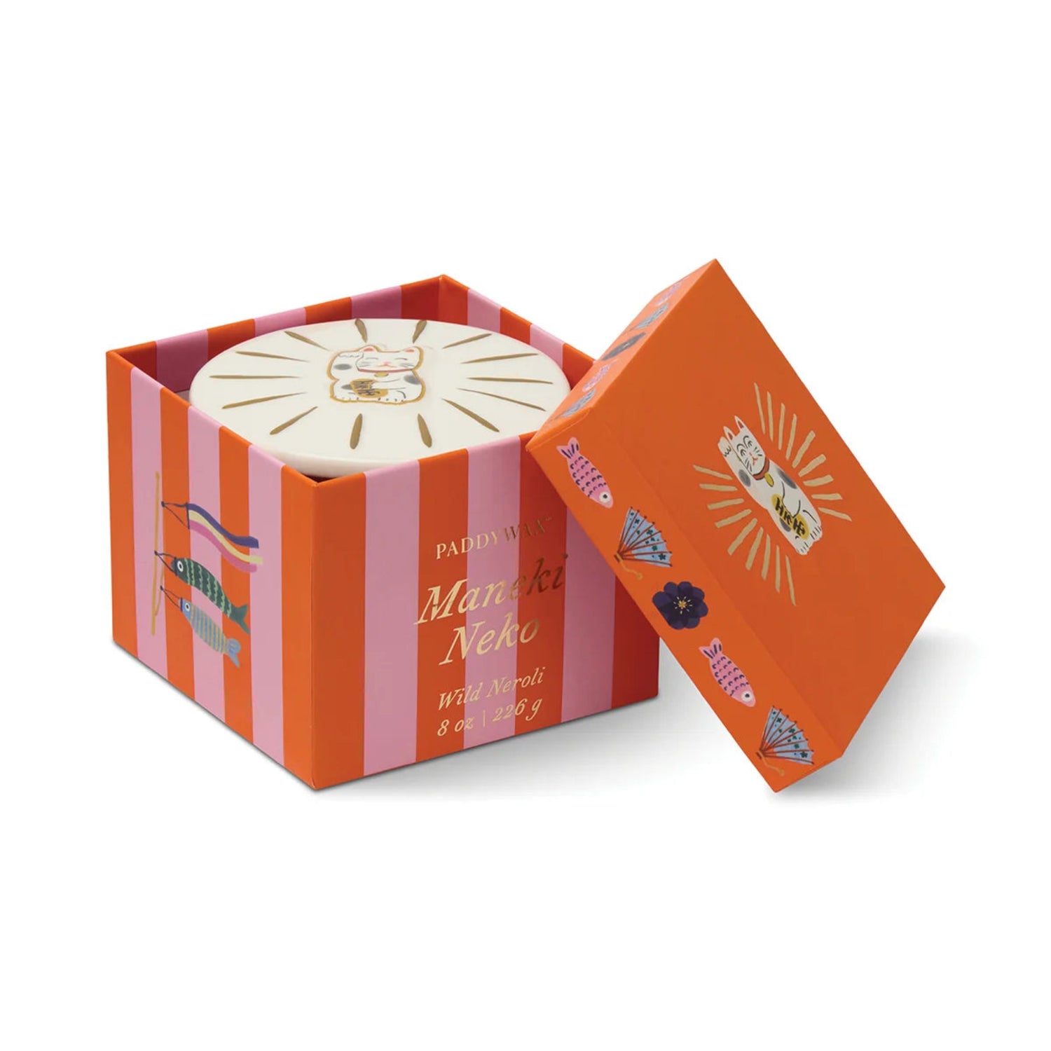 Maneki Neko candle in an open decorative box on a white background
