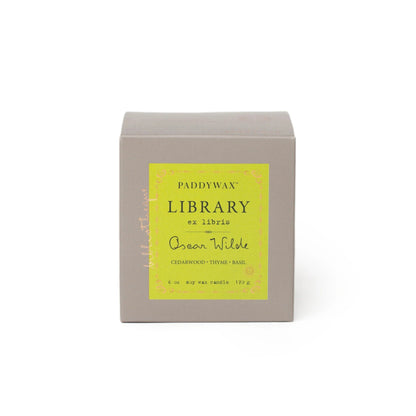 Paddywax Library candle in a box with a yellow label on a white background