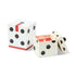 Dice-shaped candle with a matching box on a white background