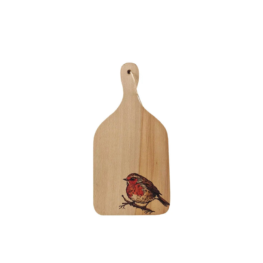 Wooden paddle cutting board with a bird design on a white background