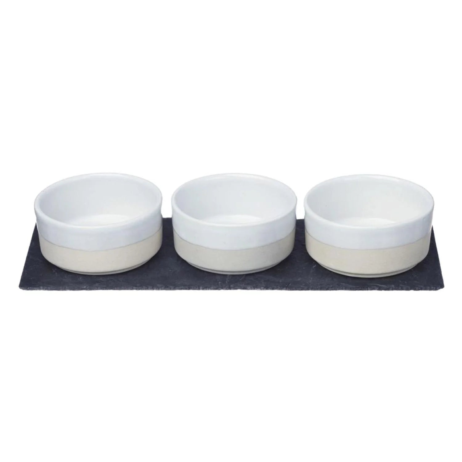 Three small ceramic bowls with white interiors and warm beige exteriors, arranged side by side on a dark rectangular tray against a plain white background.