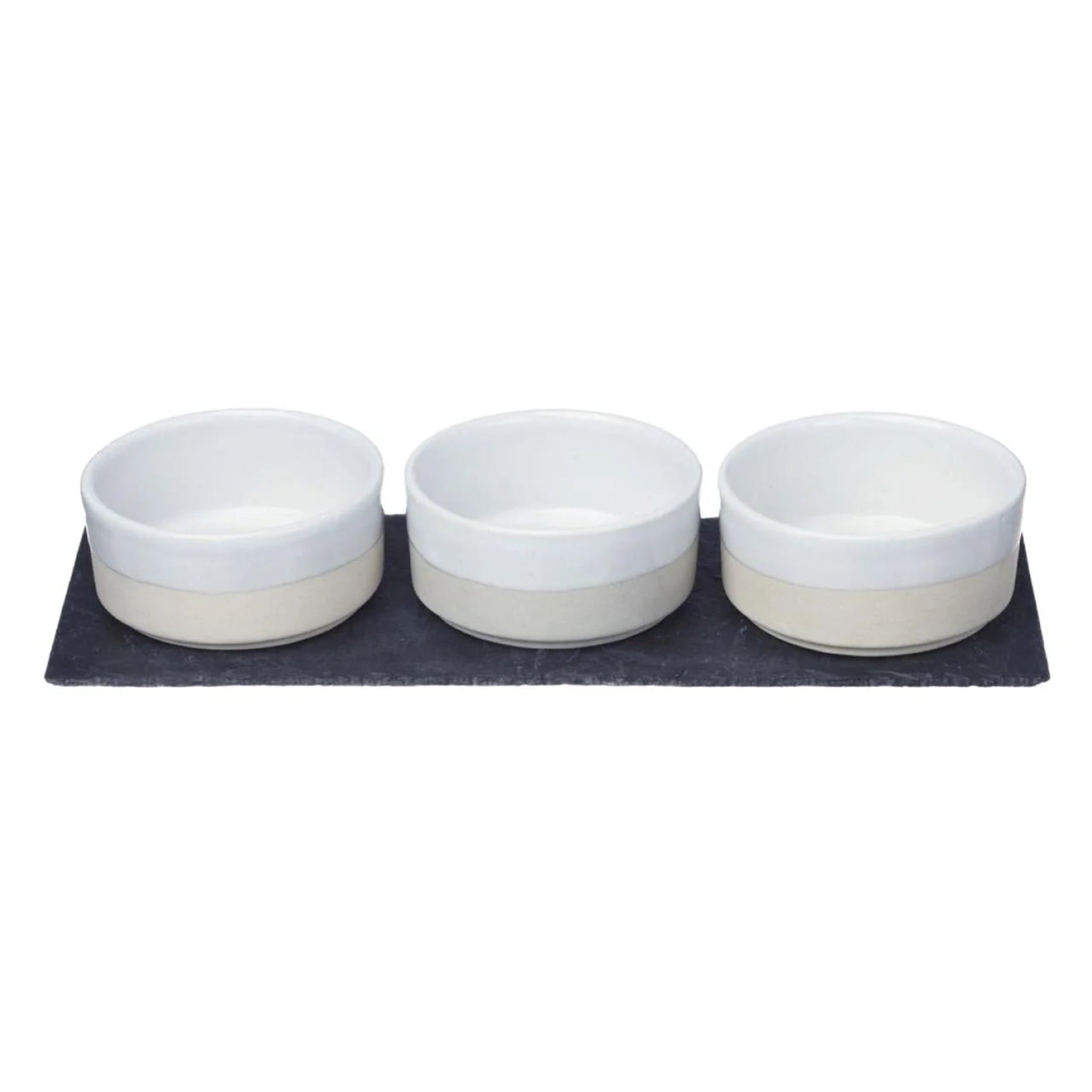 Three small ceramic bowls with white interiors and warm beige exteriors, arranged side by side on a dark rectangular tray against a plain white background.