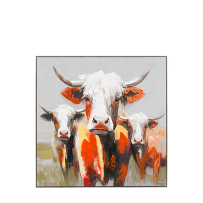 Framed artwork of three stylized cows with colorful patterns on a gray background