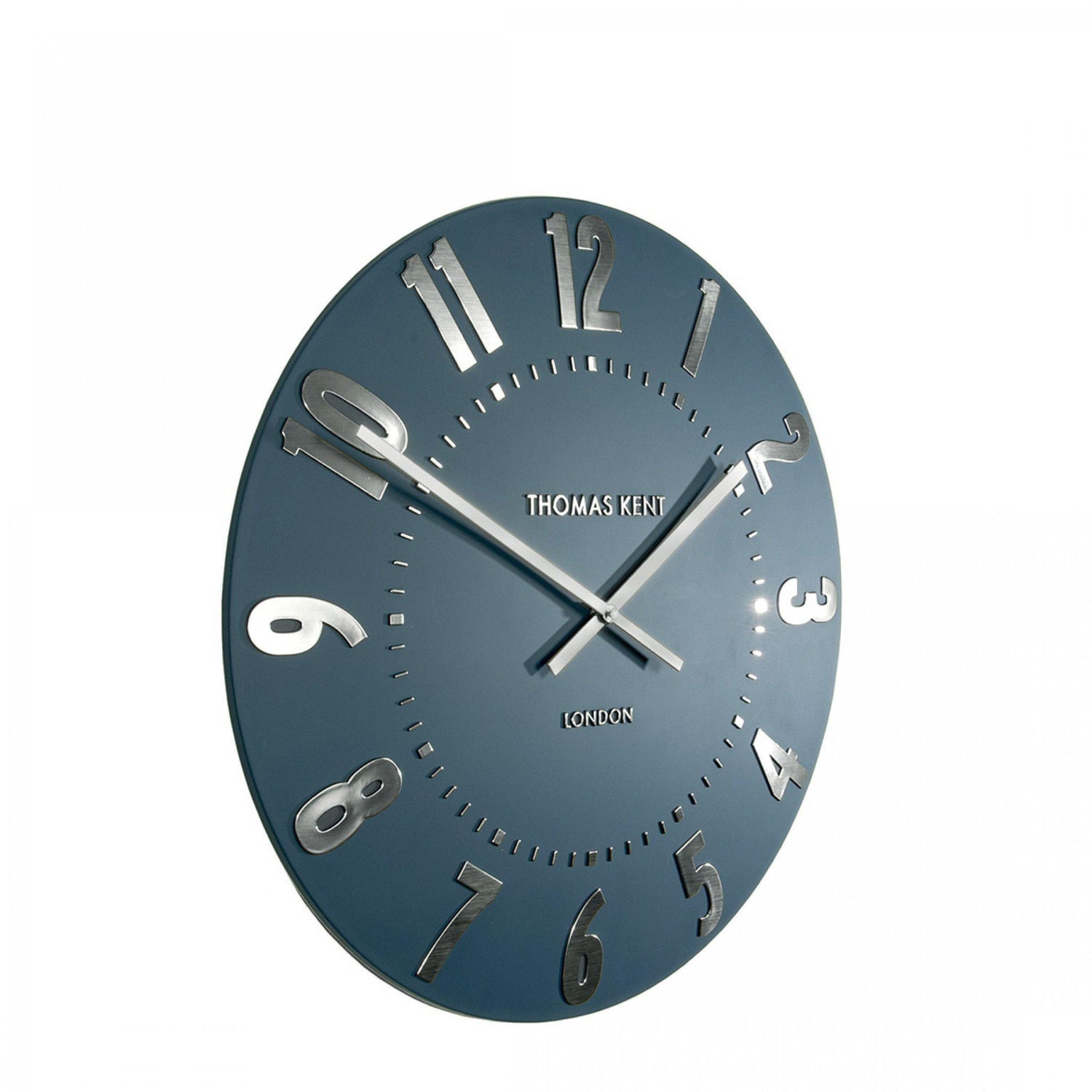 Blue wall clock with silver hands on a white background