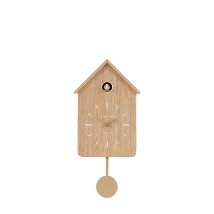 Wooden cuckoo clock on a white background