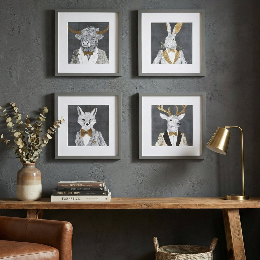 Decorative wall with framed animal prints above a wooden table, with a brown armchair and lamp in the foreground.
