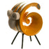 a yellow and black spiral shaped object