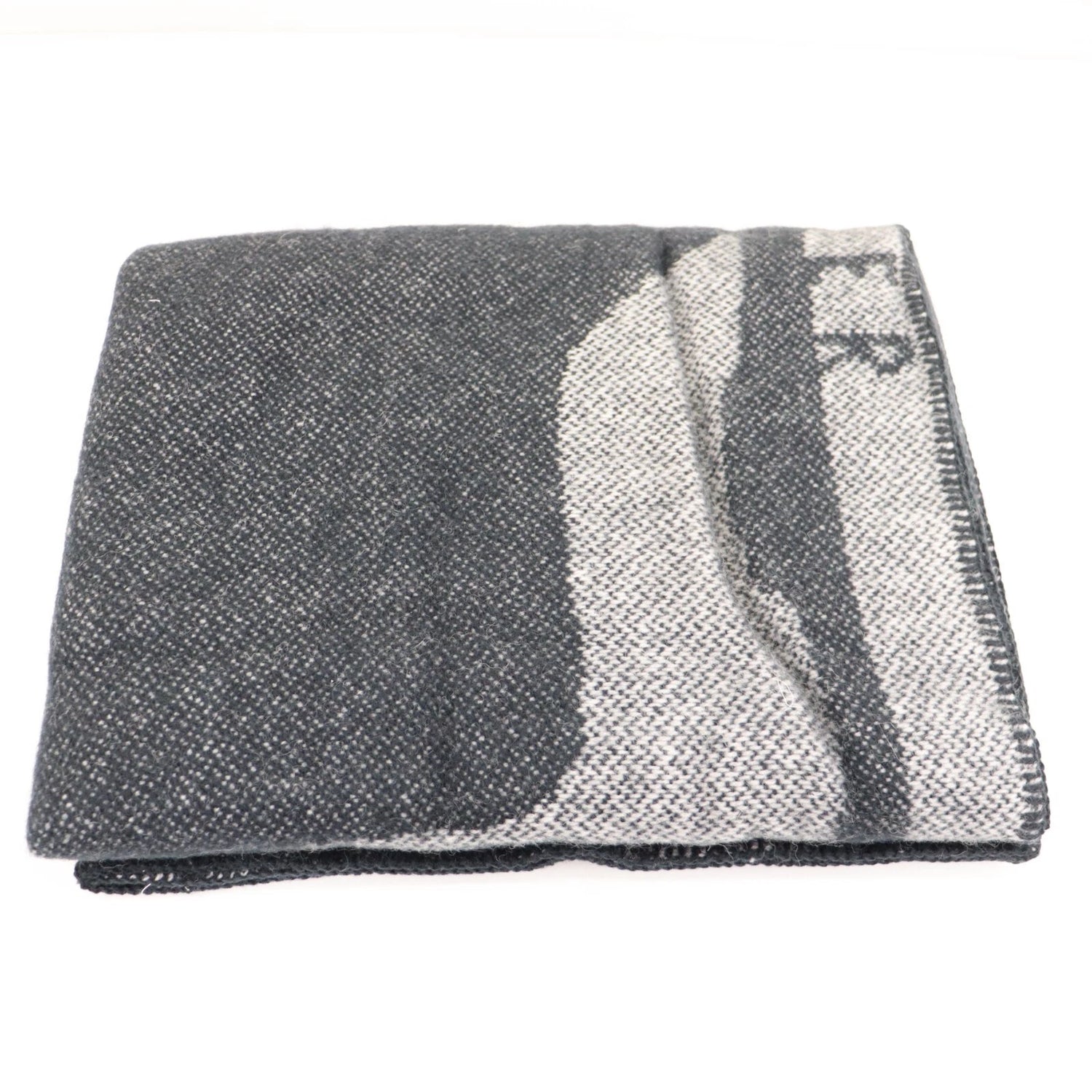 a blanket folded on a white background
