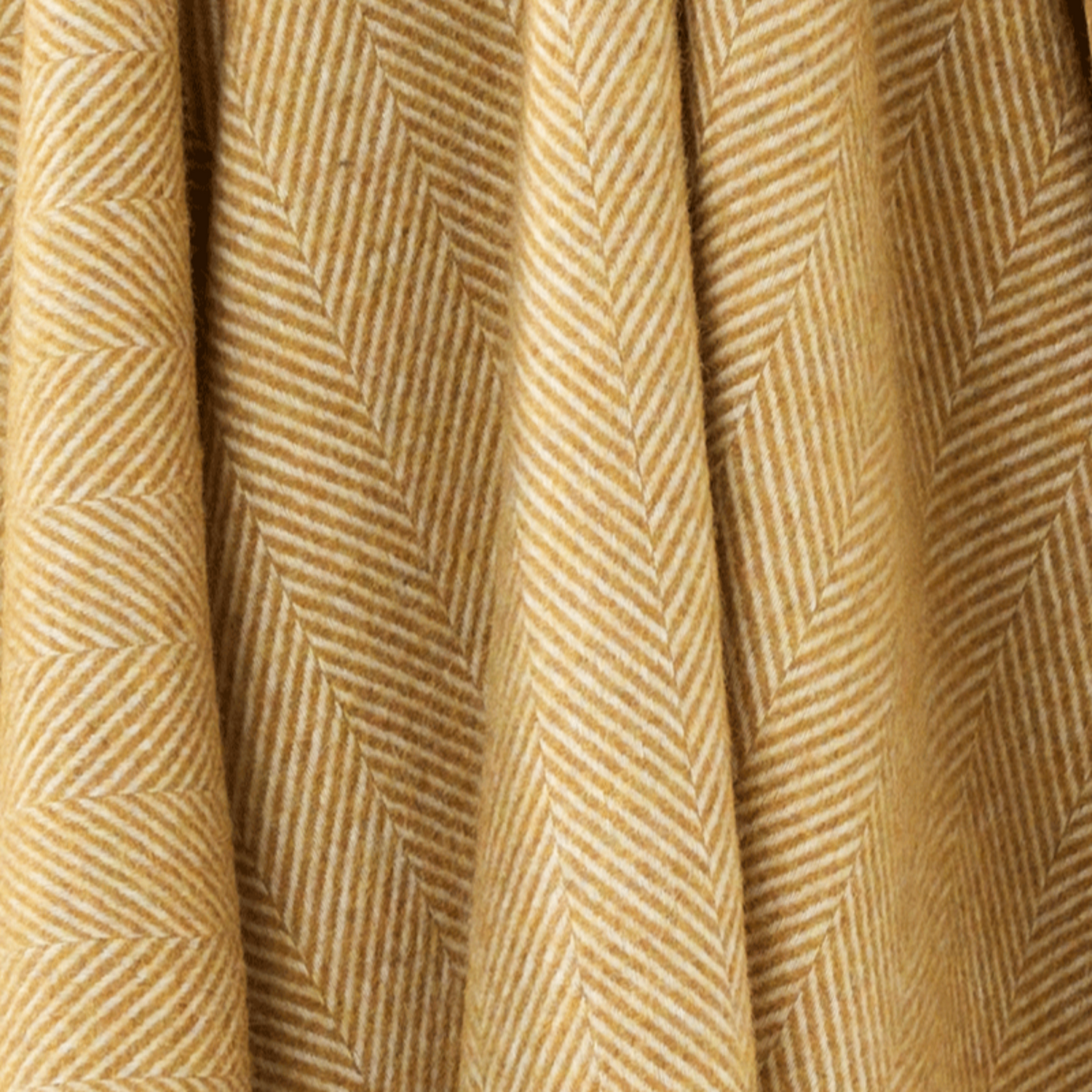 Bronte by Moon Herringbone Lambswool Throw Gold