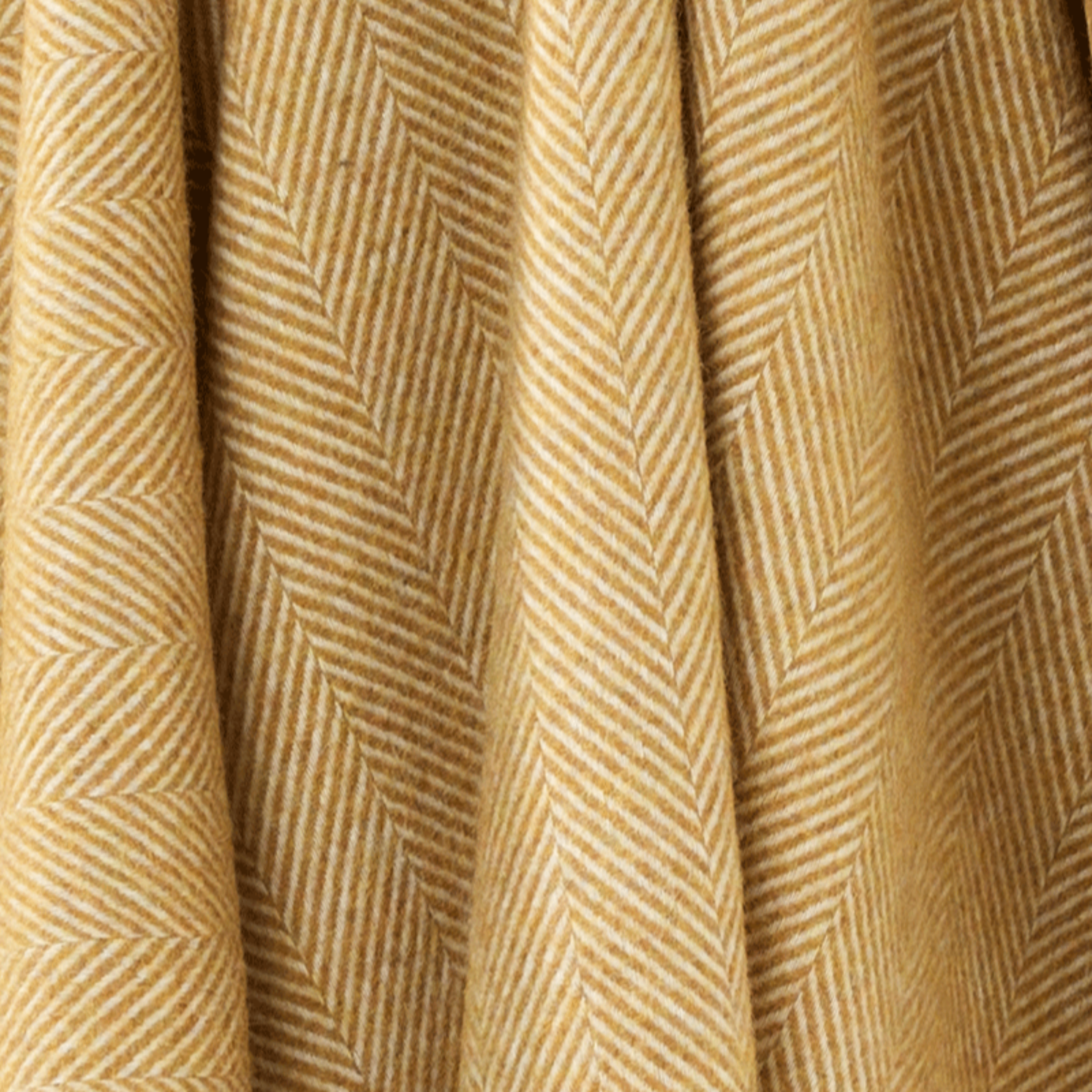 Bronte by Moon Herringbone Lambswool Throw Gold