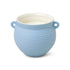 a blue candle in a pot
